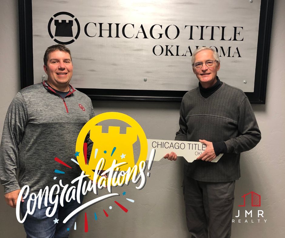 Photo of norman oklahoma real estate agent Jimmy Hughes standing with a recent client