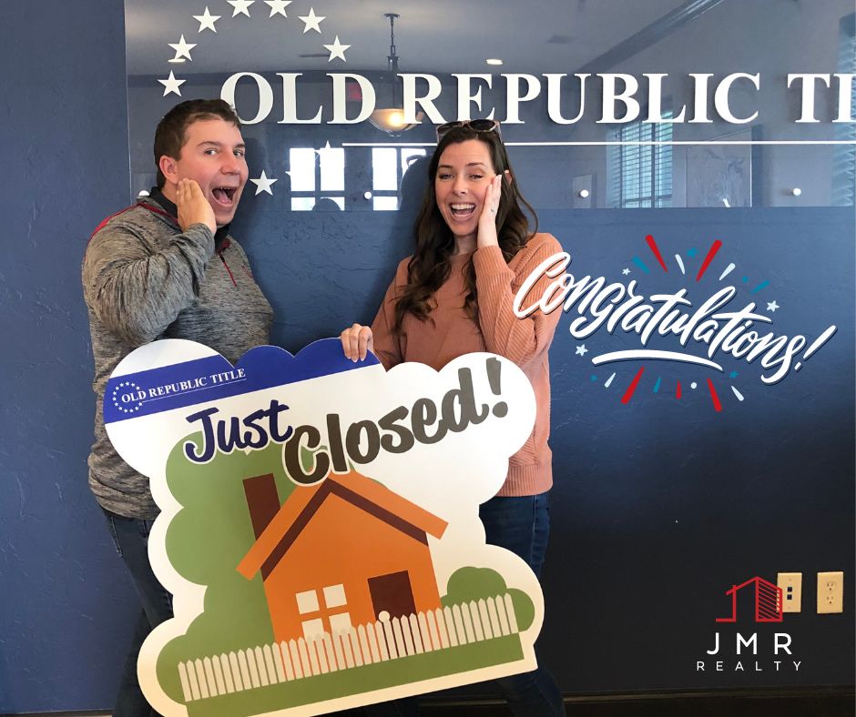 edmond realtor jimmy hughes standing with a recent home seller